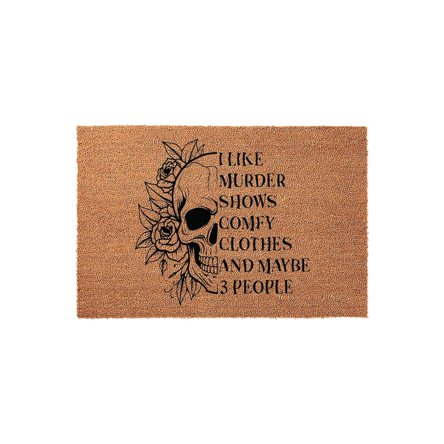 I Like Murder Shows Comfy Clothes And Maybe 3 People doormat featuring a black ink illustration of a skull surrounded by roses on a natural coir fiber background, creating a humorous and gothic aesthetic for a front porch