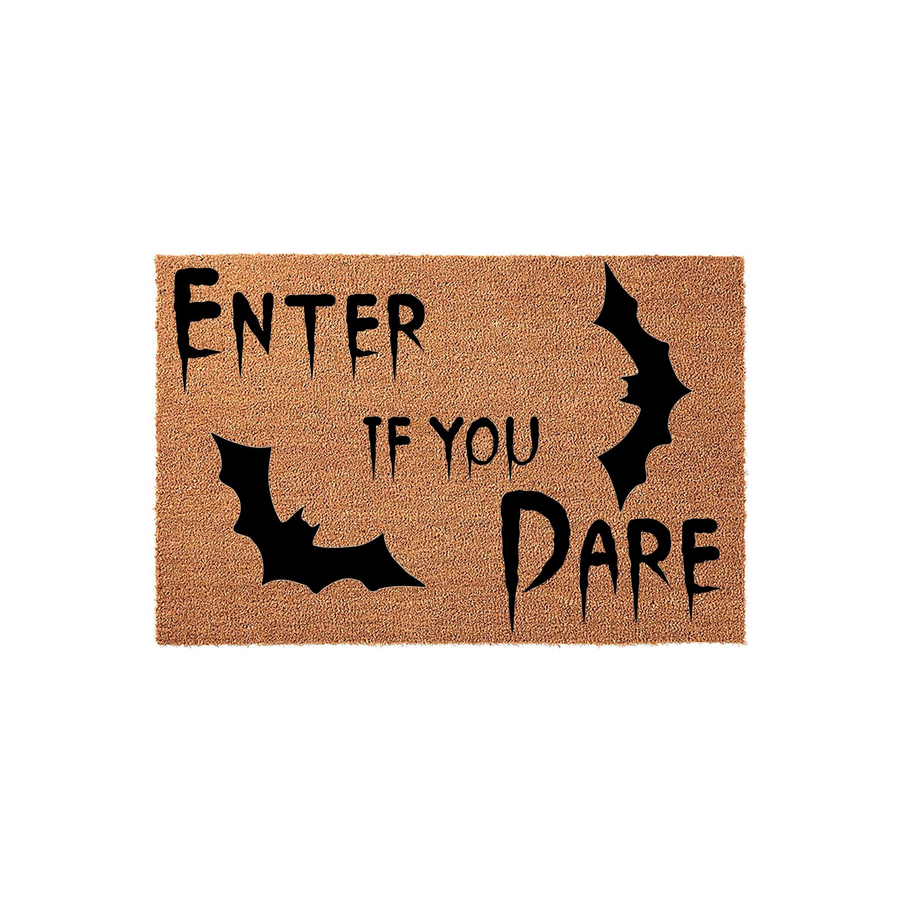 Enter If You Dare Halloween doormat featuring a natural coir texture with black printed text and spooky bat silhouettes, creating a festive and welcoming entryway decor piece for the fall season on a clean white studio background.