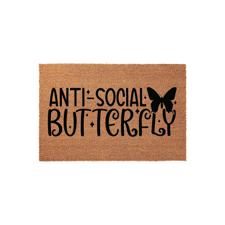 Anti-Social Butterfly coir doormat featuring bold black text and a decorative butterfly silhouette on a natural brown fiber background, creating a fun and quirky welcome mat for your front porch or entryway decor.