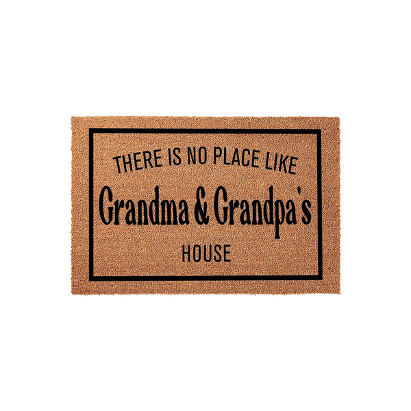 Grandma and Grandpa's House coir doormat featuring a natural brown fiber texture and a black rectangular border, with the text There Is No Place Like Grandma and Grandpa's House printed in a bold, clean black font on a white