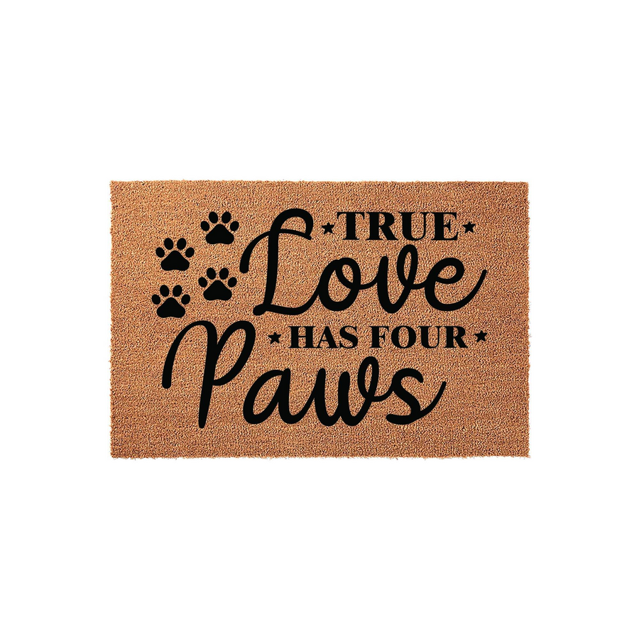 True Love Has Four Paws coir doormat featuring black paw print icons and elegant script lettering on a natural tan fiber background, creating a charming pet-themed entryway decor piece for any dog or cat lover's home front porch.
