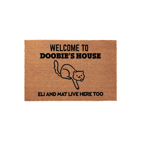 Personalized Cat Welcome Doormat featuring a cute line-art illustration of a cat and the text Welcome to Doobie's House, with additional text stating that others live here too, all printed on a natural brown coir fiber floor mat.