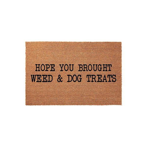 Funny Hope You Brought Weed and Dog Treats doormat featuring bold black text printed on a natural tan coir fiber mat, creating a humorous and welcoming entrance decor piece for any dog lover's home on a clean white studio