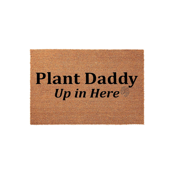 Plant Daddy Up in Here coir doormat featuring bold black text on a natural brown fiber background, perfect for a houseplant lover's entryway to show off their green thumb and sense of humor in a fun, welcoming home decor style.