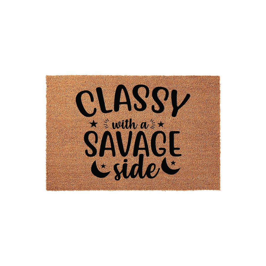 Classy with a savage side coir doormat featuring bold black typography on a natural tan fiber background, accented with stars and crescent moon icons for a fun, modern entryway decor piece that adds personality to any front porch.