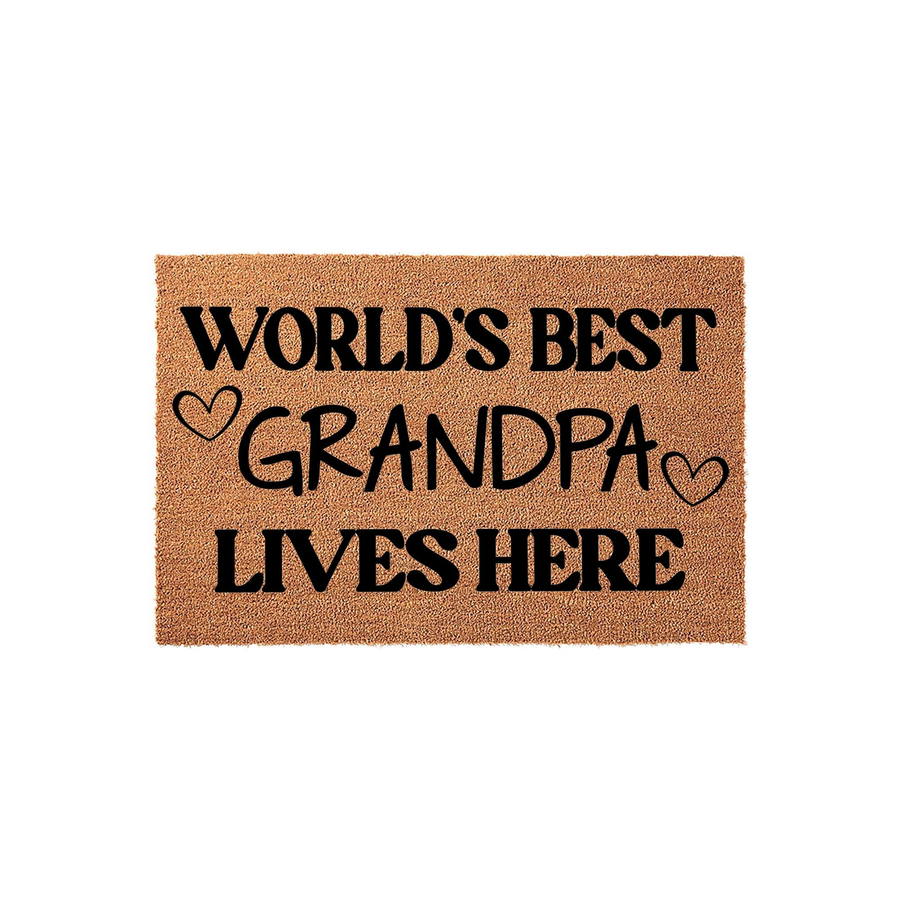 World's Best Grandpa Coir Doormat featuring bold black text on a natural brown textured fiber background, with two small hand-drawn hearts flanking the word Grandpa to create a warm welcome for any front porch or entryway.