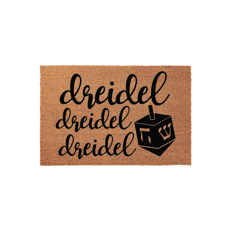 Dreidel Hanukkah Doormat featuring a natural coir texture with black script text that repeats the word dreidel three times alongside a graphic illustration of a traditional spinning top for a festive holiday home entryway decor.