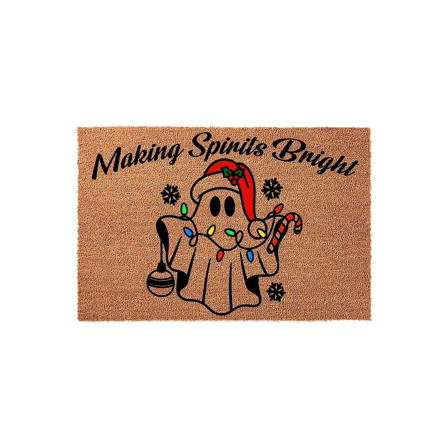 Making Spirits Bright Christmas doormat featuring a cute ghost wearing a Santa hat, wrapped in colorful holiday lights, and holding a candy cane and ornament on a natural coir fiber background for festive seasonal home decor.