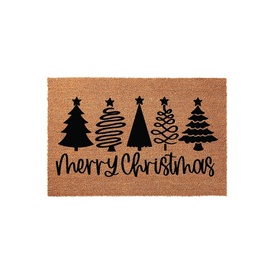 Merry Christmas coir doormat featuring a row of five unique black stylized Christmas trees printed above the festive holiday greeting, set against a natural brown textured fiber background for a classic seasonal entryway decor