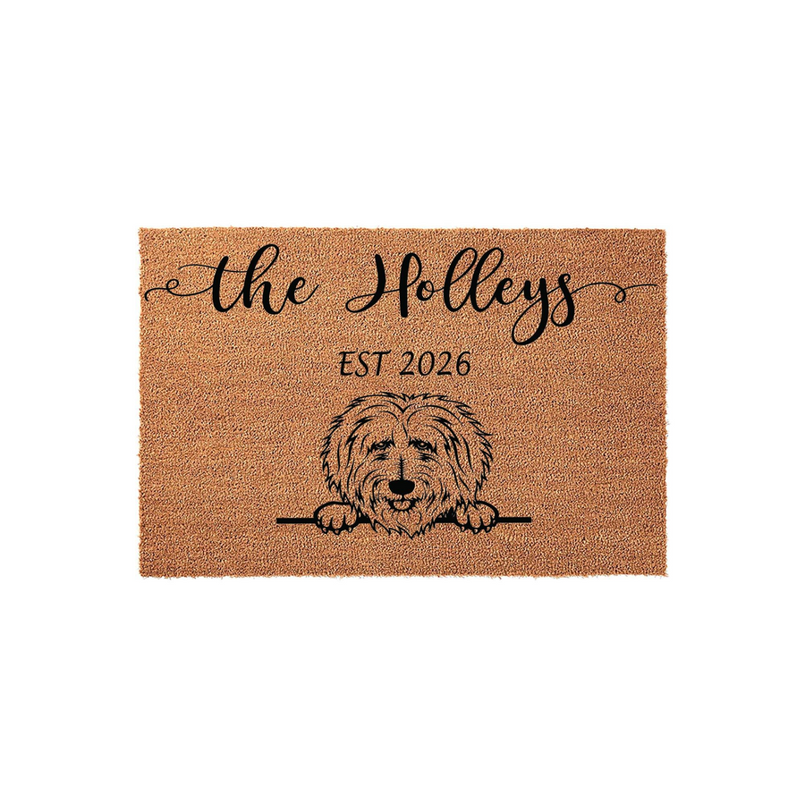 Personalized Goldendoodle Doormat featuring a cute shaggy dog illustration, custom family name text, and established year on a natural coir fiber background, making a charming entrance decor piece for any dog-loving household.