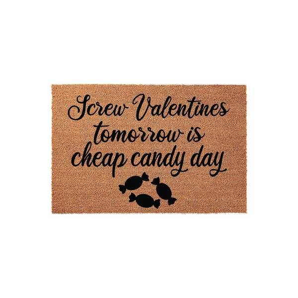 Funny Valentine's Day coir doormat featuring the text Screw Valentines tomorrow is cheap candy day in black script and block lettering, accented by three small candy illustrations on a natural brown fiber background for a front