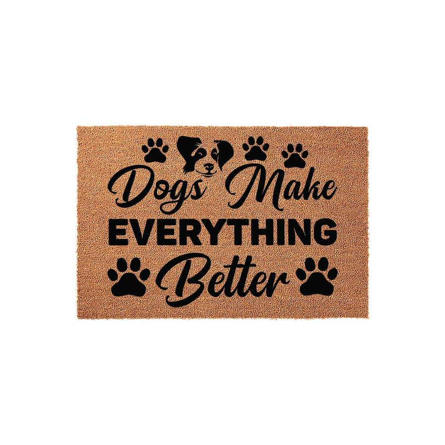 Dogs Make Everything Better coir doormat featuring a cute dog face illustration and black paw prints on a natural tan fiber background, creating a welcoming entrance for any pet lover's home with its charming and durable design.