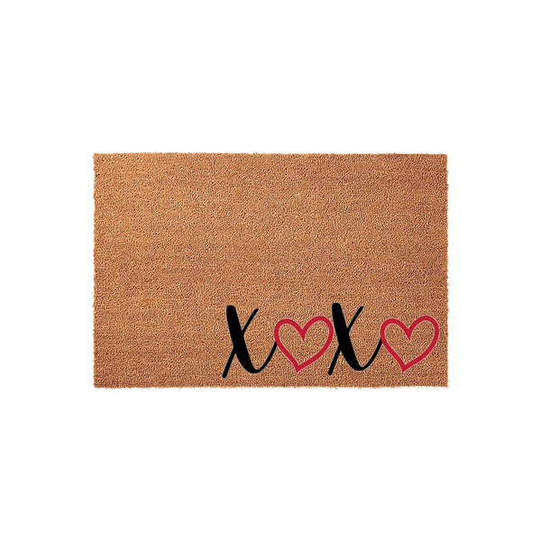 Valentine XOXO Coir Doormat featuring a natural brown coconut fiber texture with a black script design that reads XOXO, accented by two red heart outlines to create a festive and romantic entryway decor piece for your front porch.