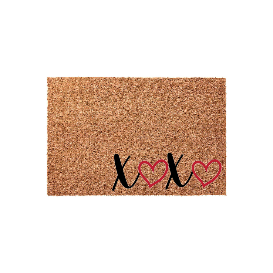 Valentine XOXO Coir Doormat featuring a natural brown coconut fiber texture with a black script design that reads XOXO, accented by two red heart outlines to create a festive and romantic entryway decor piece for your front porch.