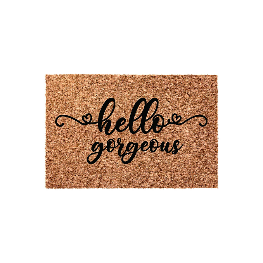 Hello Gorgeous coir doormat featuring a natural tan fiber texture and elegant black script lettering, centered on a clean white background to provide a welcoming and stylish entrance for any modern home or apartment front door.
