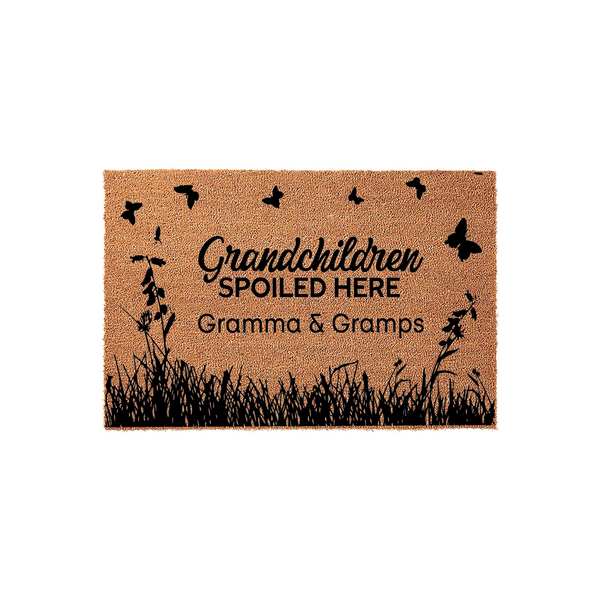 Gramma and Gramps personalized doormat featuring a natural coir texture with black silhouettes of butterflies and tall grass, displaying the text Grandchildren Spoiled Here in a charming script and bold font on a plain white