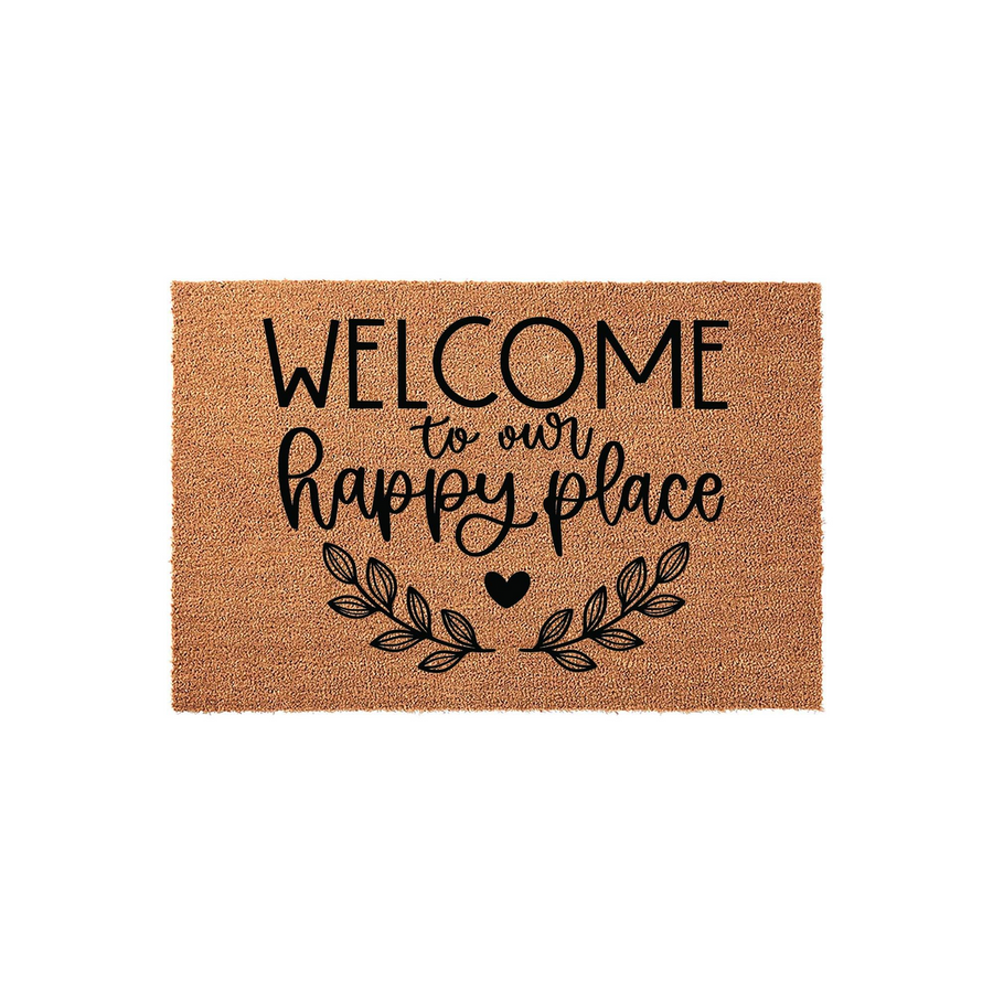 Welcome to our happy place coir doormat featuring a natural brown fiber texture with black printed text and a decorative leaf and heart design, creating a warm and inviting entryway accent for your home front porch or front door