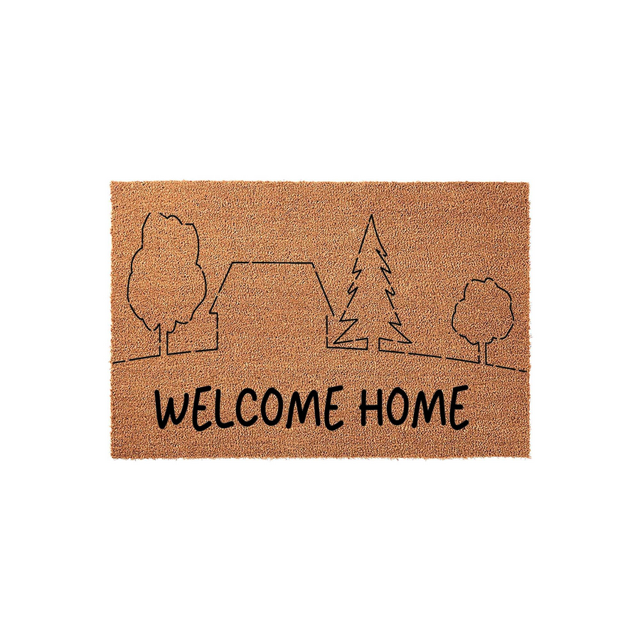 Welcome Home coir doormat featuring a minimalist line art design of a house surrounded by trees, set against a natural tan fiber background to create a warm and inviting entrance for any front porch or entryway decor.
