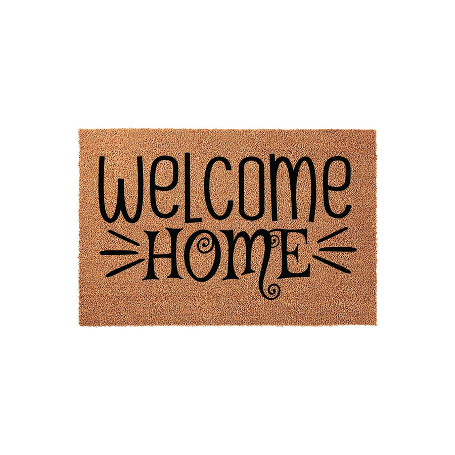 Welcome Home coir doormat featuring bold black typography centered on a natural brown fiber background, creating a rustic and inviting entryway decor piece that is perfect for any front porch or housewarming celebration.