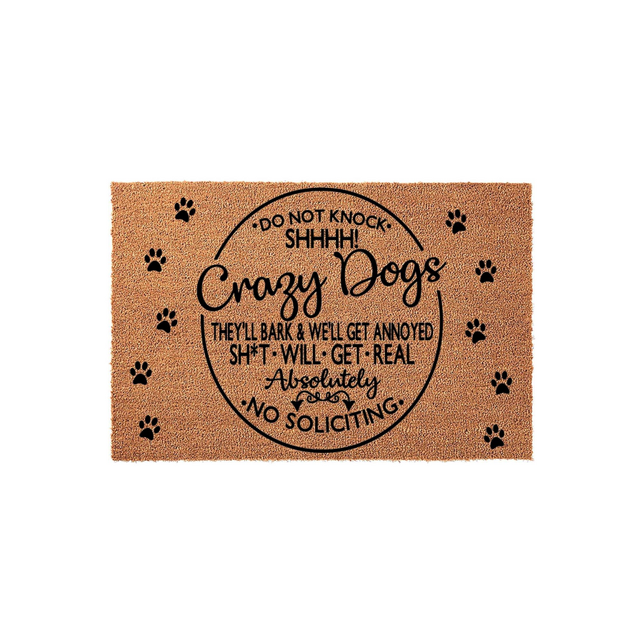 Funny Crazy Dogs doormat featuring a natural coir texture with black paw prints and bold text that reads Do Not Knock Shhhh Crazy Dogs, warning visitors that they will bark and there is absolutely no soliciting allowed at the