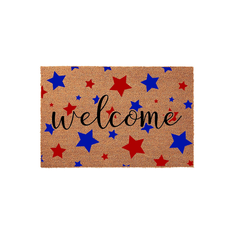 Patriotic Welcome Doormat featuring a natural coir texture decorated with a repeating pattern of red and blue stars, centered with the word Welcome written in a stylish black cursive script for a festive Fourth of July porch