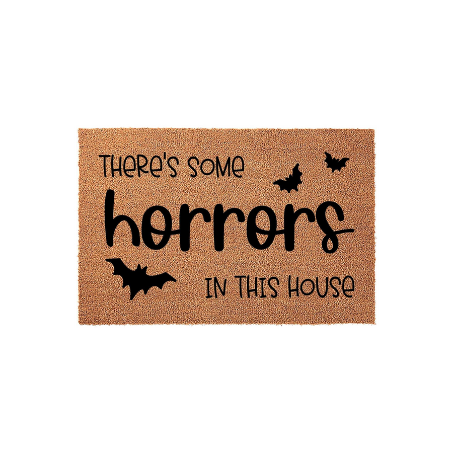 Halloween Horror Themed Coir Doormat featuring the text There is some horrors in this house with black bat silhouettes printed on a natural brown fiber background, creating a spooky entryway decor piece for the fall season.
