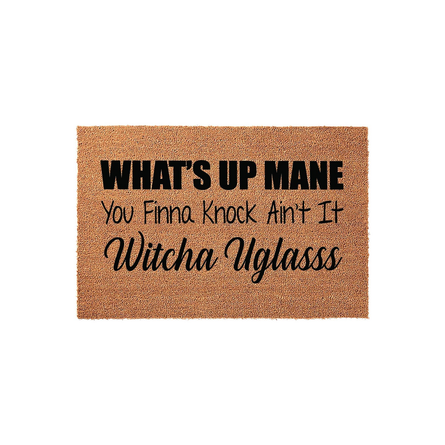 Funny Welcome Doormat with the text What's Up Mane You Finna Knock Ain't It Witcha Uglasss printed in black ink on a natural tan coir fiber mat, featuring a humorous greeting for your front porch entrance on a clean white