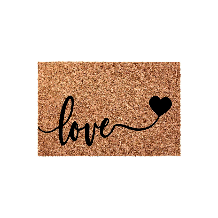 Love Coir Doormat featuring a natural tan fiber texture with the word love written in elegant black script lettering, finished with a small heart icon on the right side to create a welcoming entryway decor piece for your front