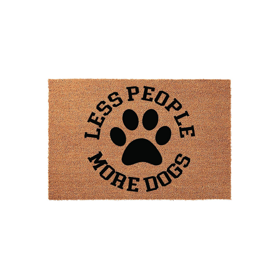 Less People More Dogs coir doormat featuring a large black paw print graphic in the center, surrounded by bold black text on a natural tan fiber background, creating a humorous and welcoming entrance for any dog lover's front