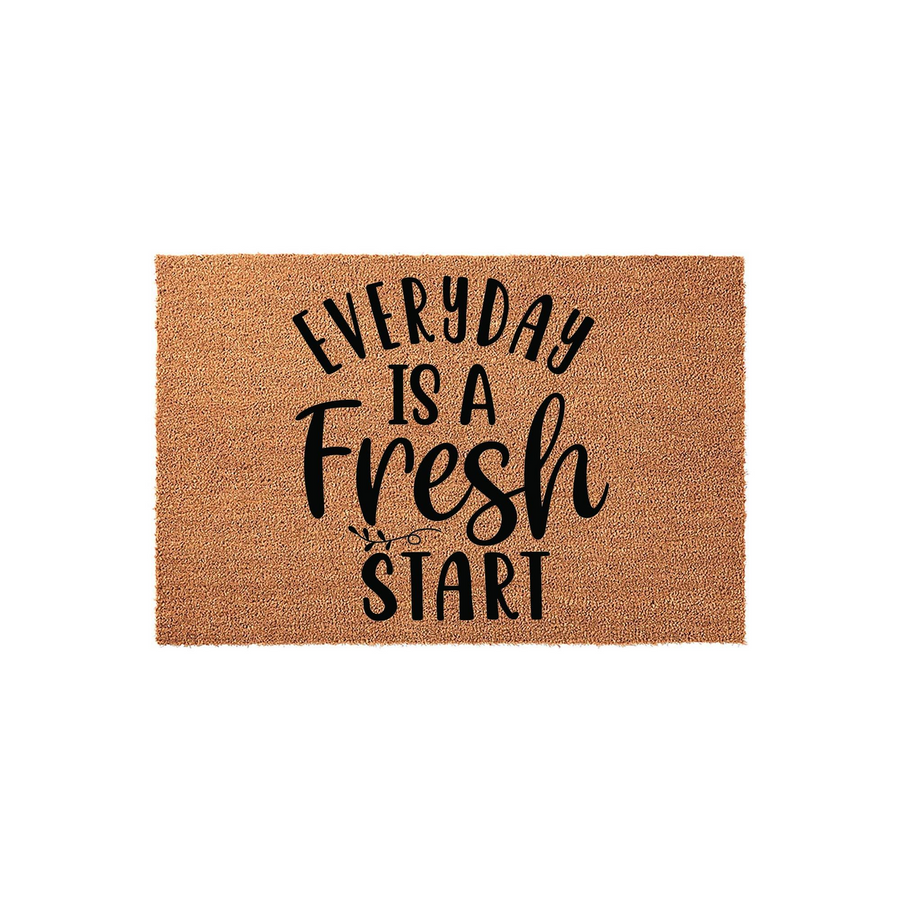 Everyday Is A Fresh Start coir doormat featuring bold black typography centered on a natural brown textured fiber surface, creating a welcoming and inspirational entryway decor piece for your home front porch or apartment door