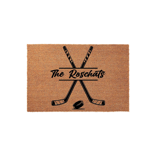 Personalized hockey family name doormat featuring a pair of crossed hockey sticks and a puck printed in black on a natural coir fiber mat, creating a sporty entrance decor piece for any hockey fan home or sports enthusiast front