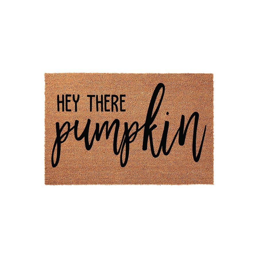 Hey There Pumpkin coir doormat featuring a natural tan fiber texture and bold black lettering, creating a festive fall entryway decor piece that welcomes guests to your home with a charming seasonal message for the autumn season.