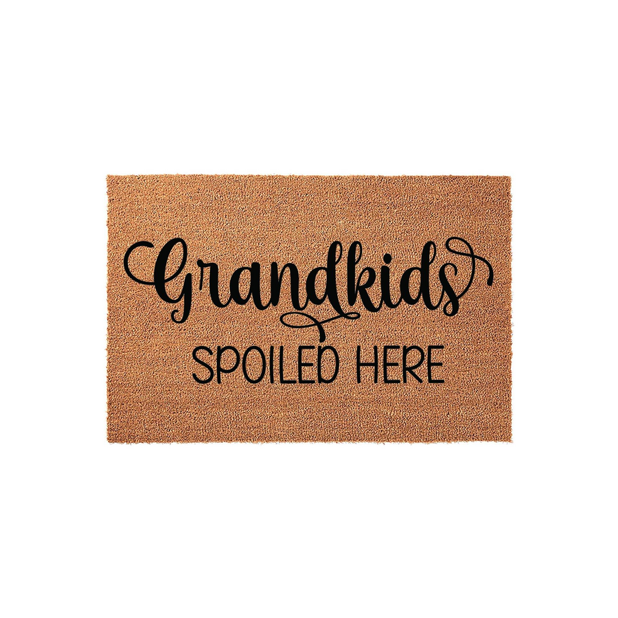 Grandkids Spoiled Here coir doormat featuring natural brown coconut fiber texture and bold black lettering, making a fun and welcoming front porch entrance for any grandparent who loves to spoil their visiting grandchildren.