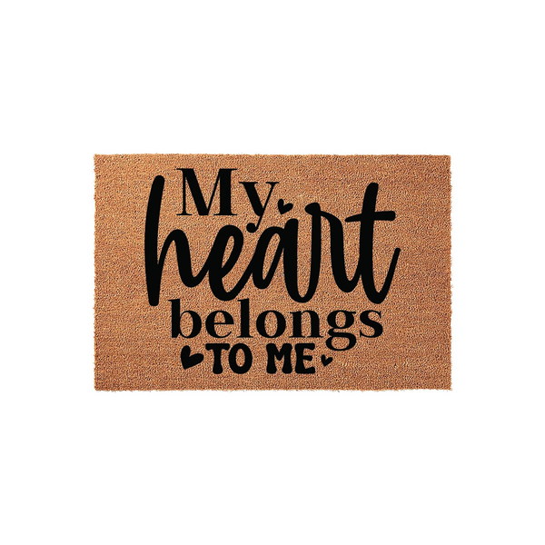 My Heart Belongs To Me coir doormat featuring bold black typography printed on a natural tan fiber background, creating a humorous and empowering entryway decor piece for a home that celebrates self-love and personal independence.