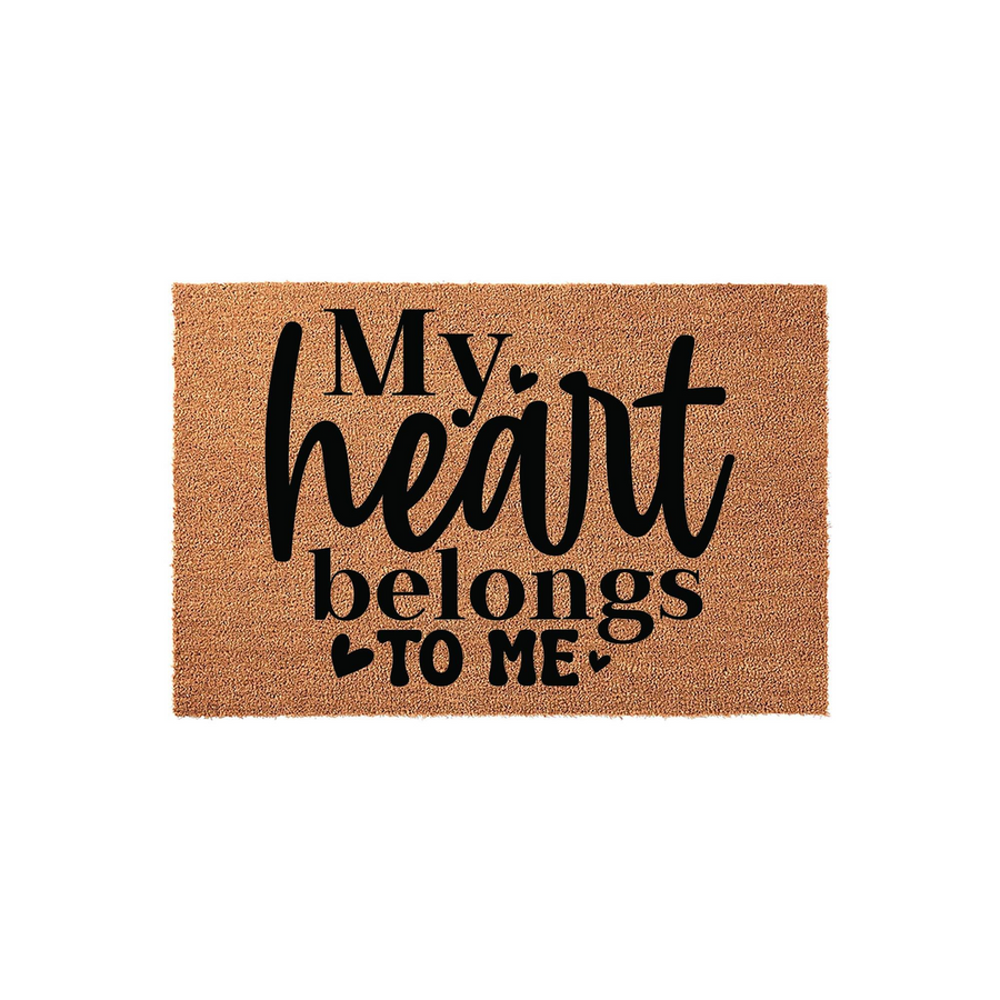 My Heart Belongs To Me coir doormat featuring bold black typography printed on a natural tan fiber background, creating a humorous and empowering entryway decor piece for a home that celebrates self-love and personal independence.