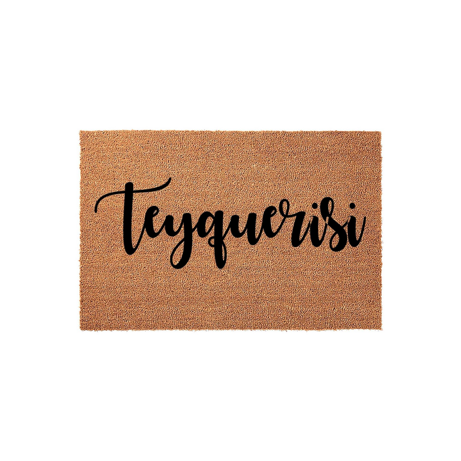 Personalized coir doormat featuring custom script lettering centered on a natural tan fiber background, providing a durable and welcoming entrance mat for your home front porch or entryway decor with a clean studio white backdrop.