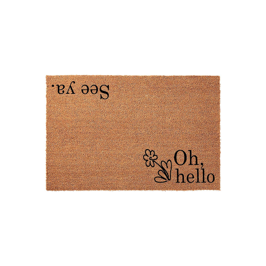 Oh hello see ya coir doormat featuring a natural brown fiber texture with black printed text that reads Oh hello on one side and See ya on the other, creating a fun and welcoming entryway decor piece for your front porch or home