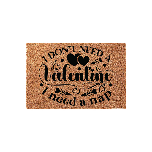 Funny Valentine doormat made of natural coir fiber featuring the black printed text I don't need a Valentine I need a nap, decorated with heart and arrow graphics on a plain white background for a humorous holiday home entrance