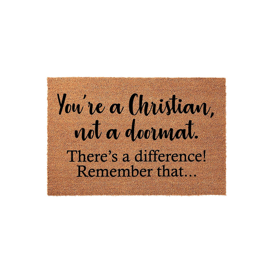 Christian Quote Doormat featuring a natural coir texture with black script text that reads You are a Christian, not a doormat, making it a bold and faith-inspired entryway rug for your home decor on a clean white studio