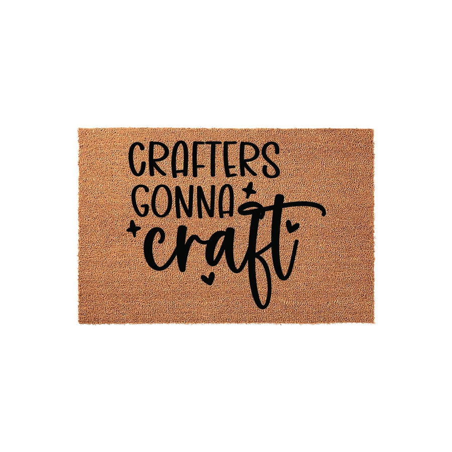 Crafters Gonna Craft coir doormat featuring a natural brown fiber texture and bold black lettering in a playful script font, centered on a clean white background to showcase the fun hobby-themed design for any creative home