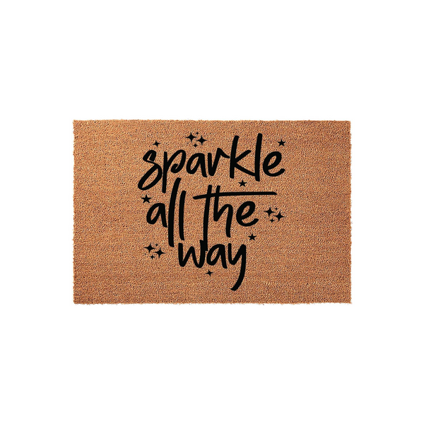 Sparkle All The Way coir doormat featuring a natural brown fiber texture and bold black script lettering, accented with small star icons to create a festive and welcoming entrance for your front porch or home entryway decor.