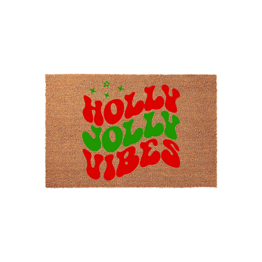 Holly Jolly Vibes Christmas doormat featuring a natural coir texture with bold, wavy red and green typography that adds a festive touch to your front porch decor during the holiday season for a cheerful and welcoming home