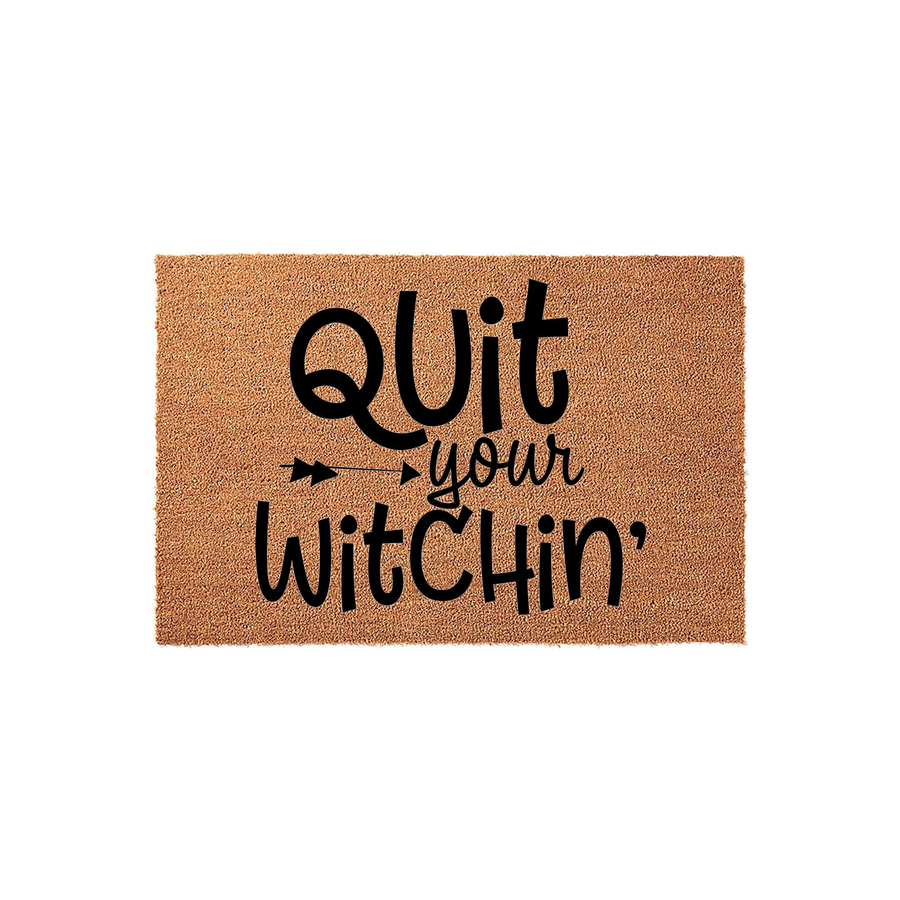 Quit Your Witchin' Halloween doormat made of natural coir fiber, featuring bold black typography and a small arrow graphic centered on a plain white background for a fun and festive seasonal porch decor accent for your front