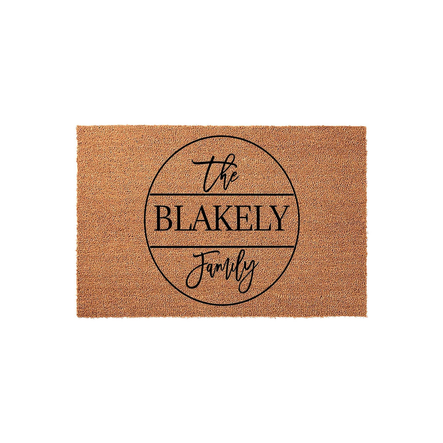 Personalized family name coir doormat featuring a circular design with elegant script and block lettering, set against a plain white background to highlight the natural tan texture of the durable outdoor welcome mat for your