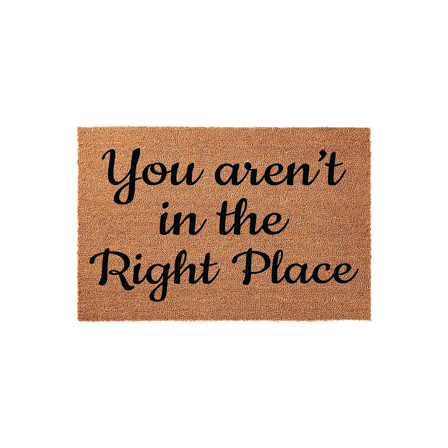 Funny You aren't in the Right Place coir doormat featuring bold black cursive lettering printed on a natural brown coconut fiber mat, providing a humorous and welcoming touch to your front porch entryway decor.