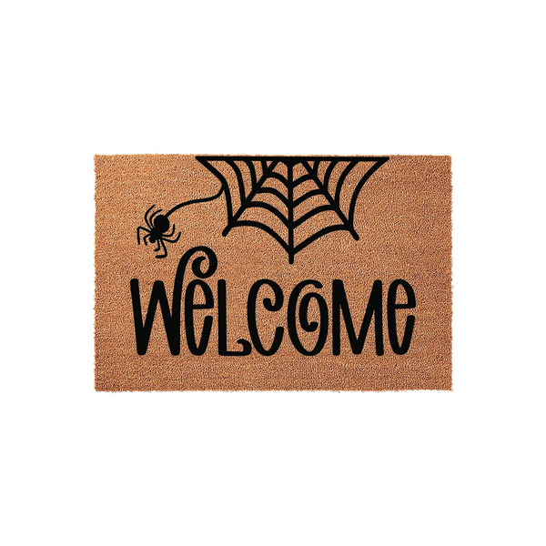 Halloween Welcome Doormat featuring a natural coir texture with a black spider and web design printed above the word Welcome in a decorative script font, creating a festive spooky entryway decor piece for the fall season.