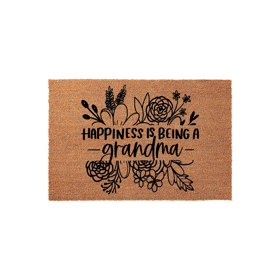 Happiness Is Being A Grandma coir doormat featuring a natural tan fiber texture and black ink typography, decorated with elegant floral line art illustrations that frame the sentimental message for a front porch entryway.