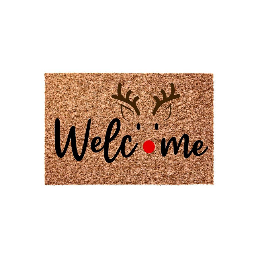 Reindeer Welcome Doormat featuring a festive holiday design on a natural coir mat, with the word Welcome written in black script and a bright red nose replacing the letter o, accented by brown reindeer antlers above the text.