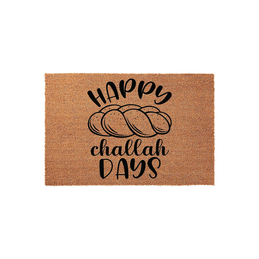 Happy Challah Days coir doormat featuring a black graphic of a braided loaf of bread centered on a natural tan fiber background, creating a festive and welcoming entryway decor piece for the Jewish holiday season and Shabbat