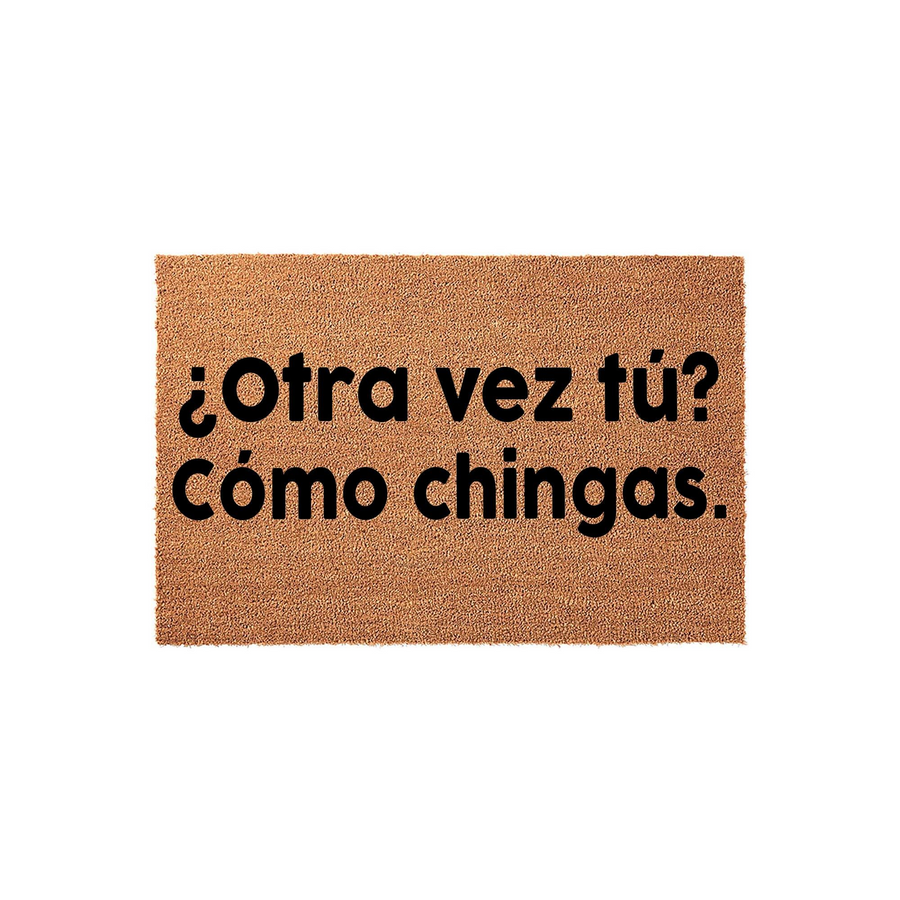 Funny Spanish doormat made of natural coir fibers, featuring bold black text that reads Otra vez tu? Como chingas, providing a humorous and sarcastic welcome for guests at your front door entrance on a plain white studio
